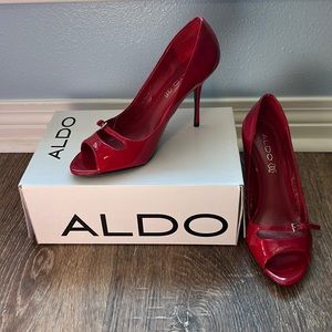 Red patent leather stiletto heels from ALDO, size 8.5